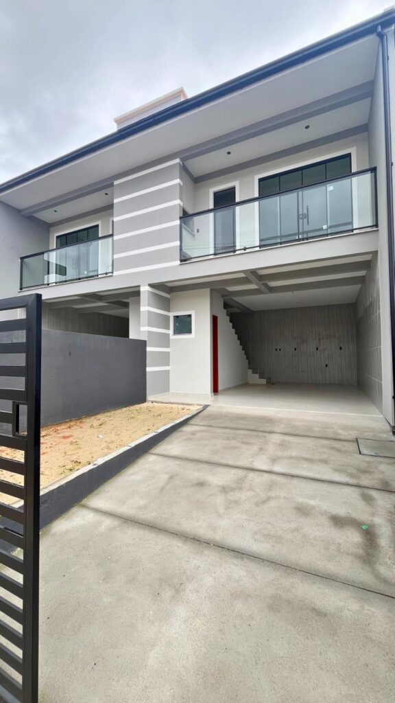 Foto 1 de Casa geminada – Garagem coberta