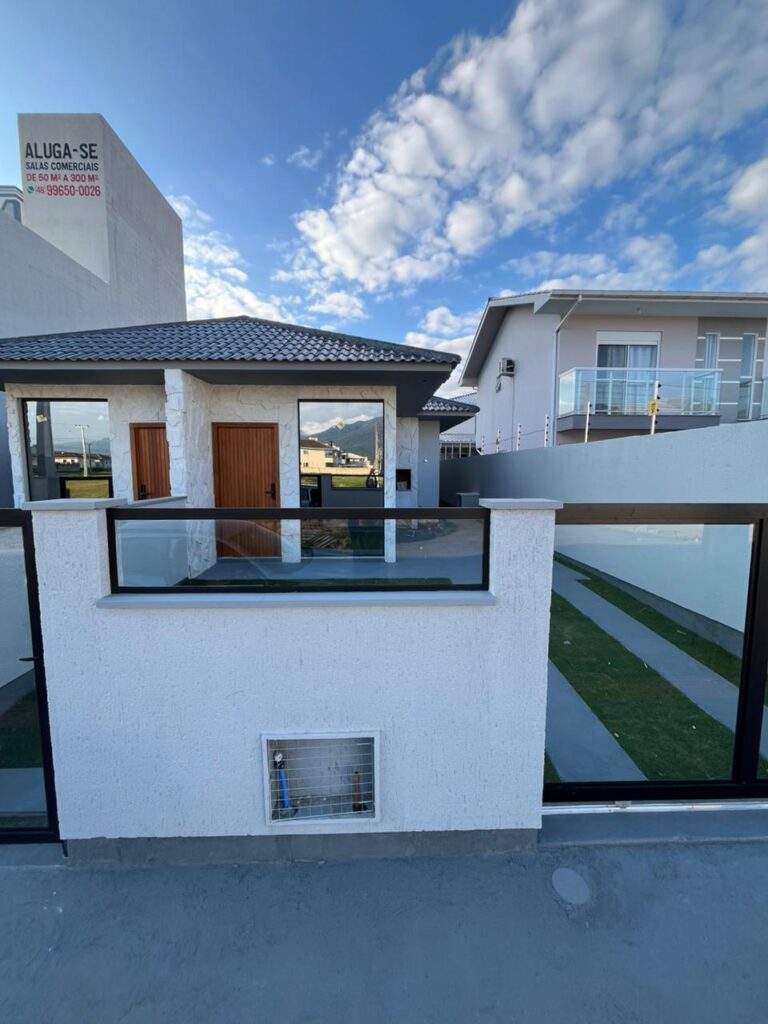Foto 2 de Casa térrea com 3 dormitórios e churrasqueira