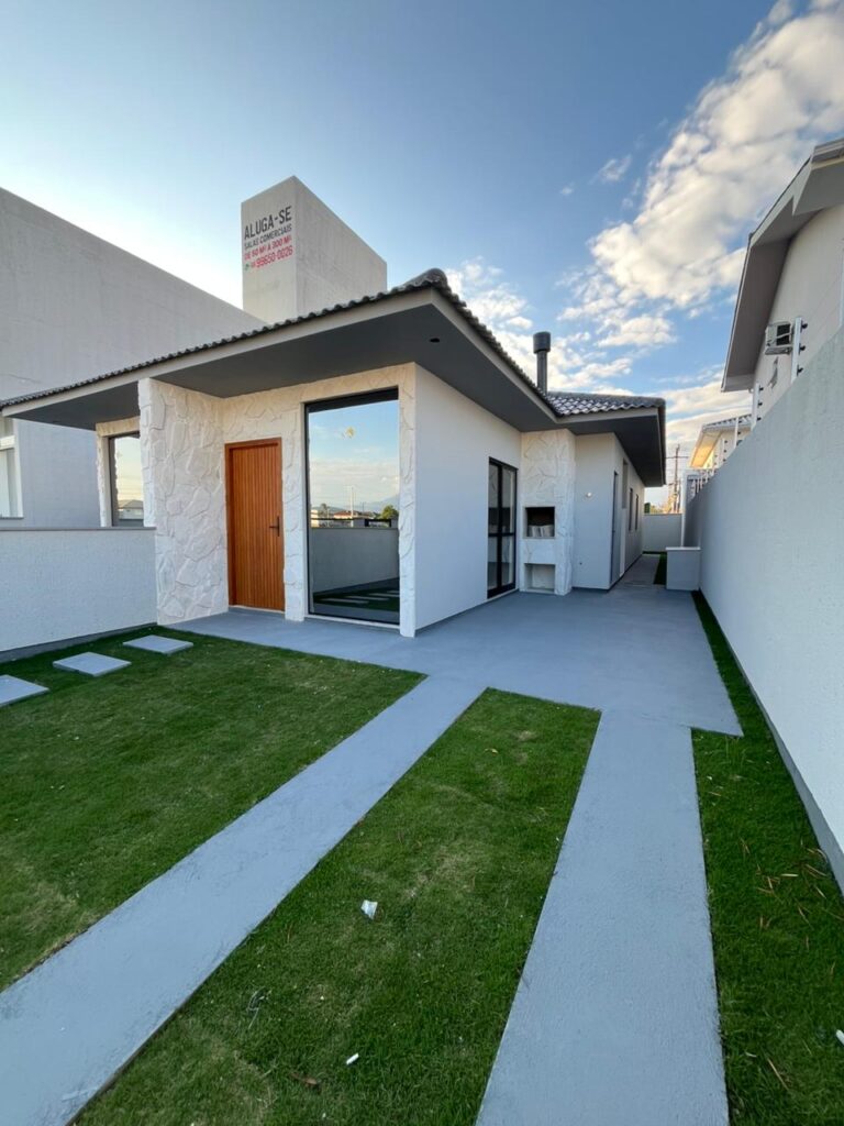 Foto 1 de Casa térrea com 3 dormitórios e churrasqueira