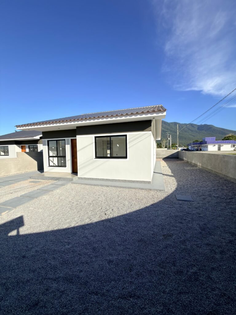 Foto 2 de Casa de esquina com muito espaço de terreno