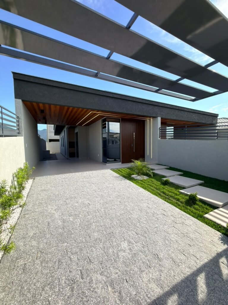 Foto 2 de Casa térrea com 3 dormitórios e churrasqueira