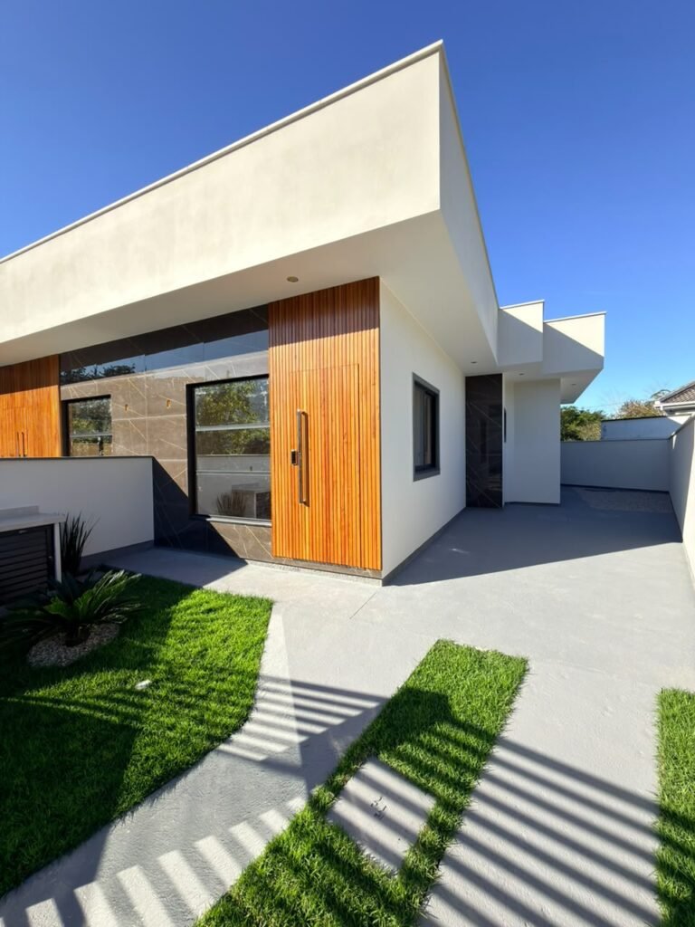 Foto 2 de Casa com fachada moderna e ótimo acabamento